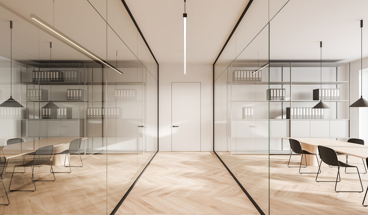 Glass office corridor with two meeting rooms